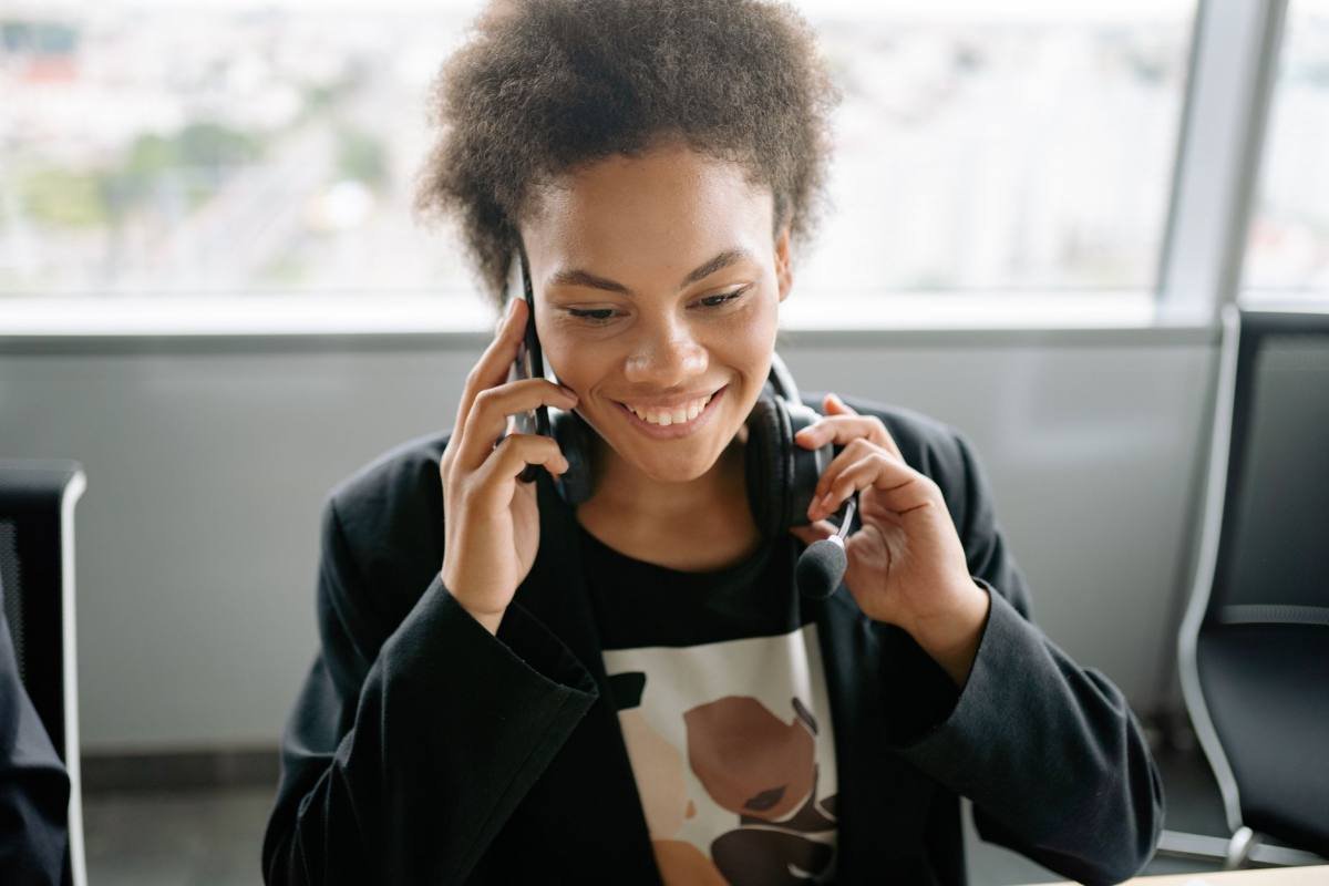 A person on the phone at a desk